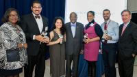 Faculty members and students show their awards at a Kenneth A. Forde Diversity Alliance Reception.